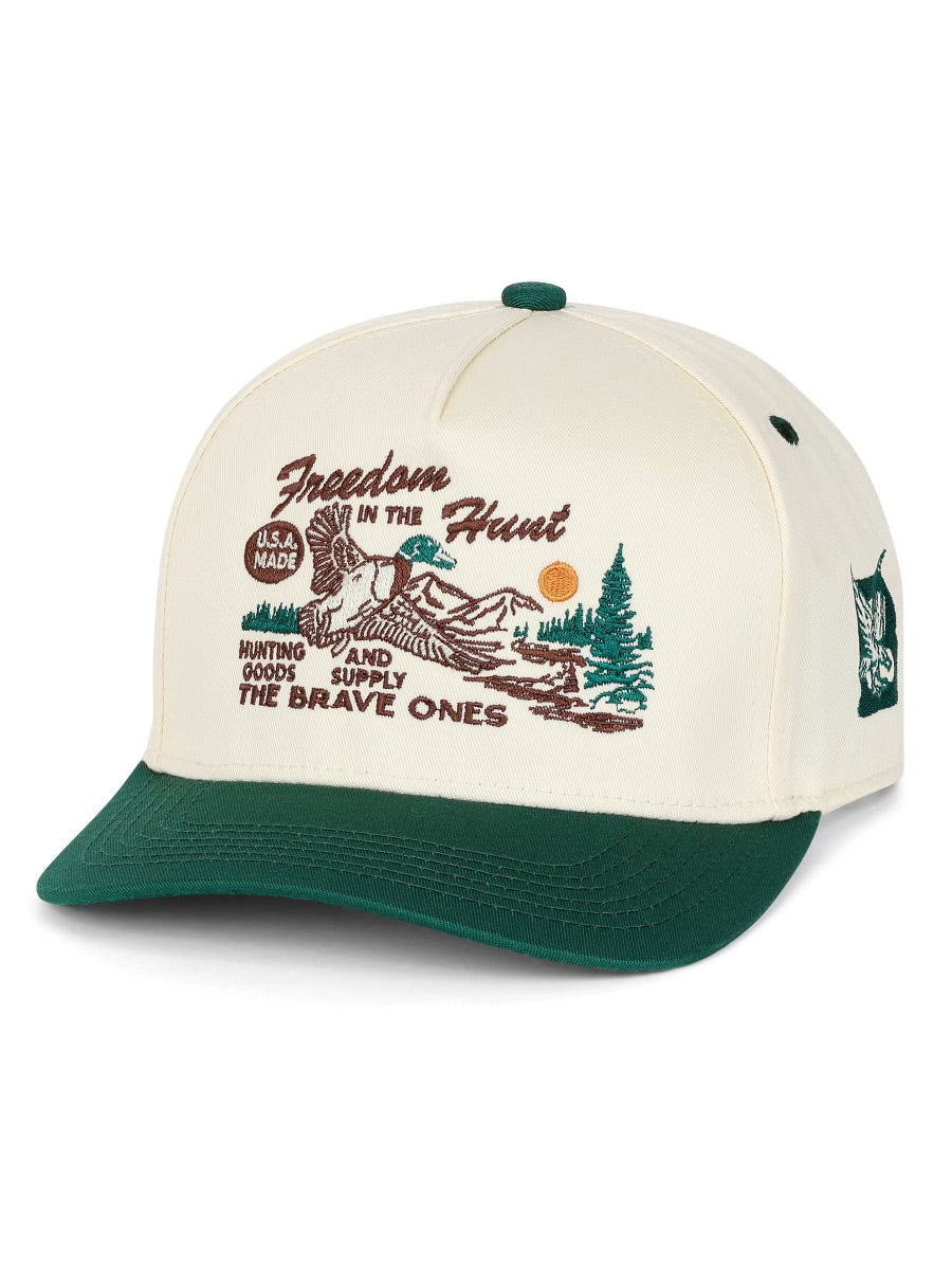 The Brave Ones hunting cap with "Freedom in the Hunt" slogan and vintage colorway